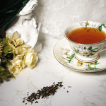 brewed and loose leaf green tea and black tea blend