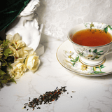 brewed and loose leaf green tea and black tea blend